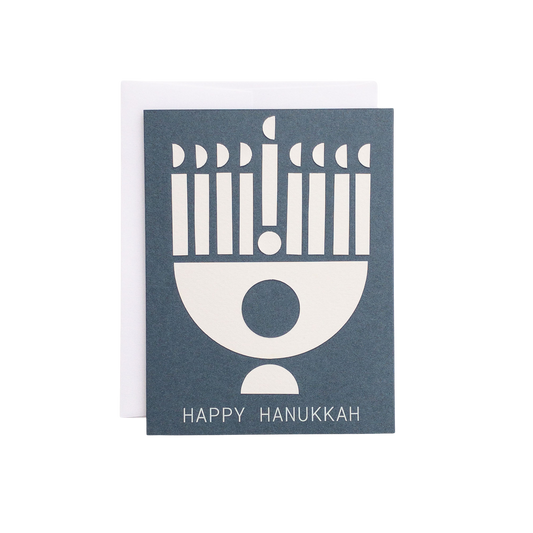 Greeting card with menorah design and 'Happy Hanukkah' text on a blue background