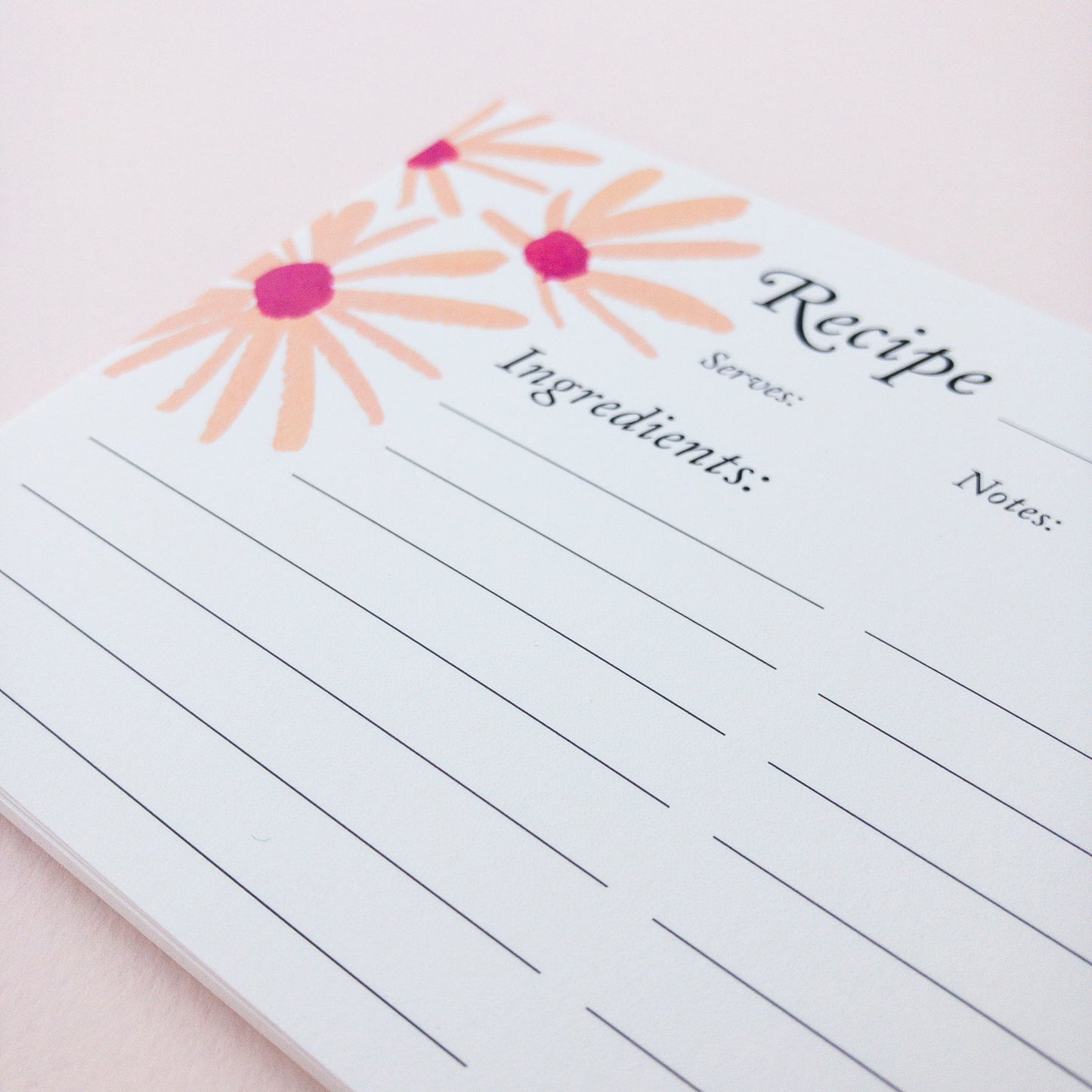 Recipe card with floral design on a white background