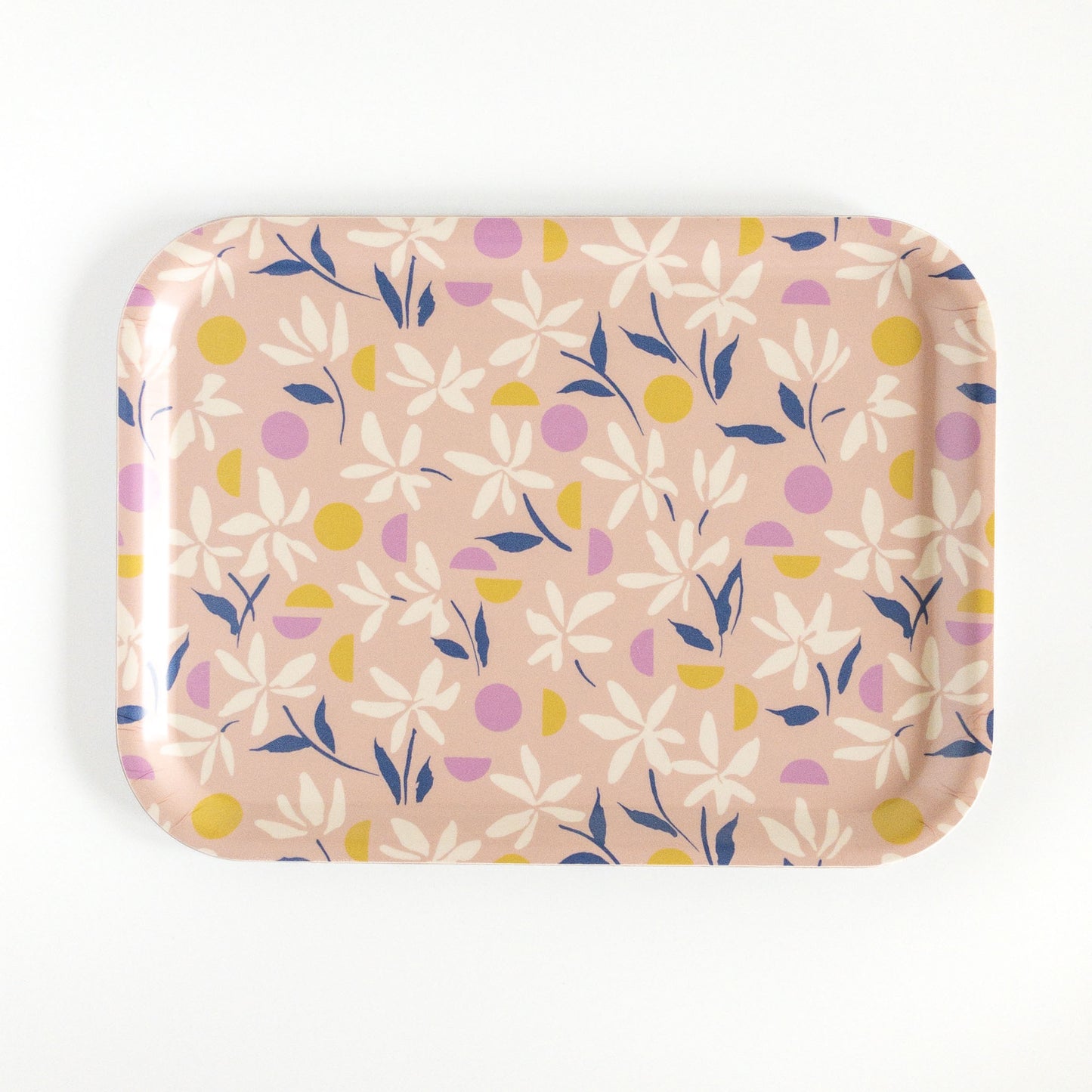 Pink floral tray on a white background.