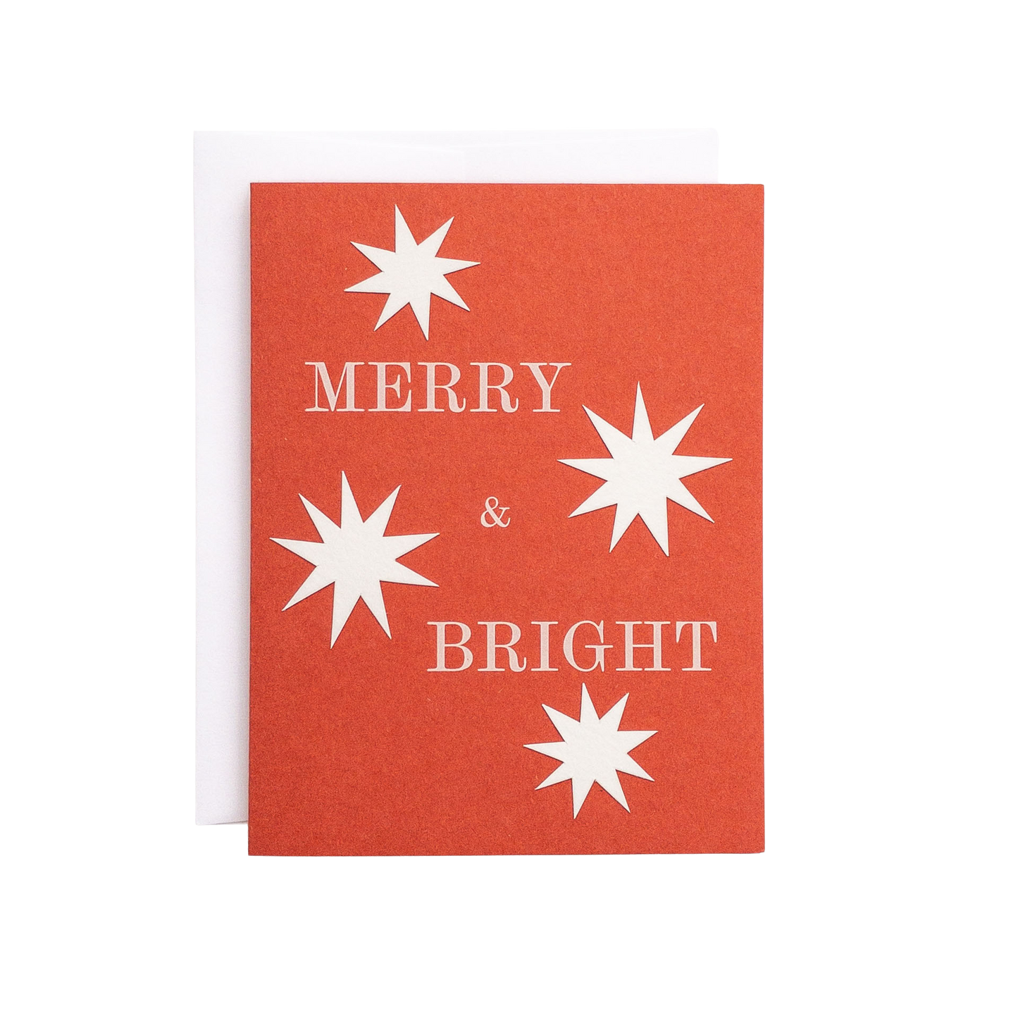 Red card with white stars and 'Merry & Bright' text on a white background