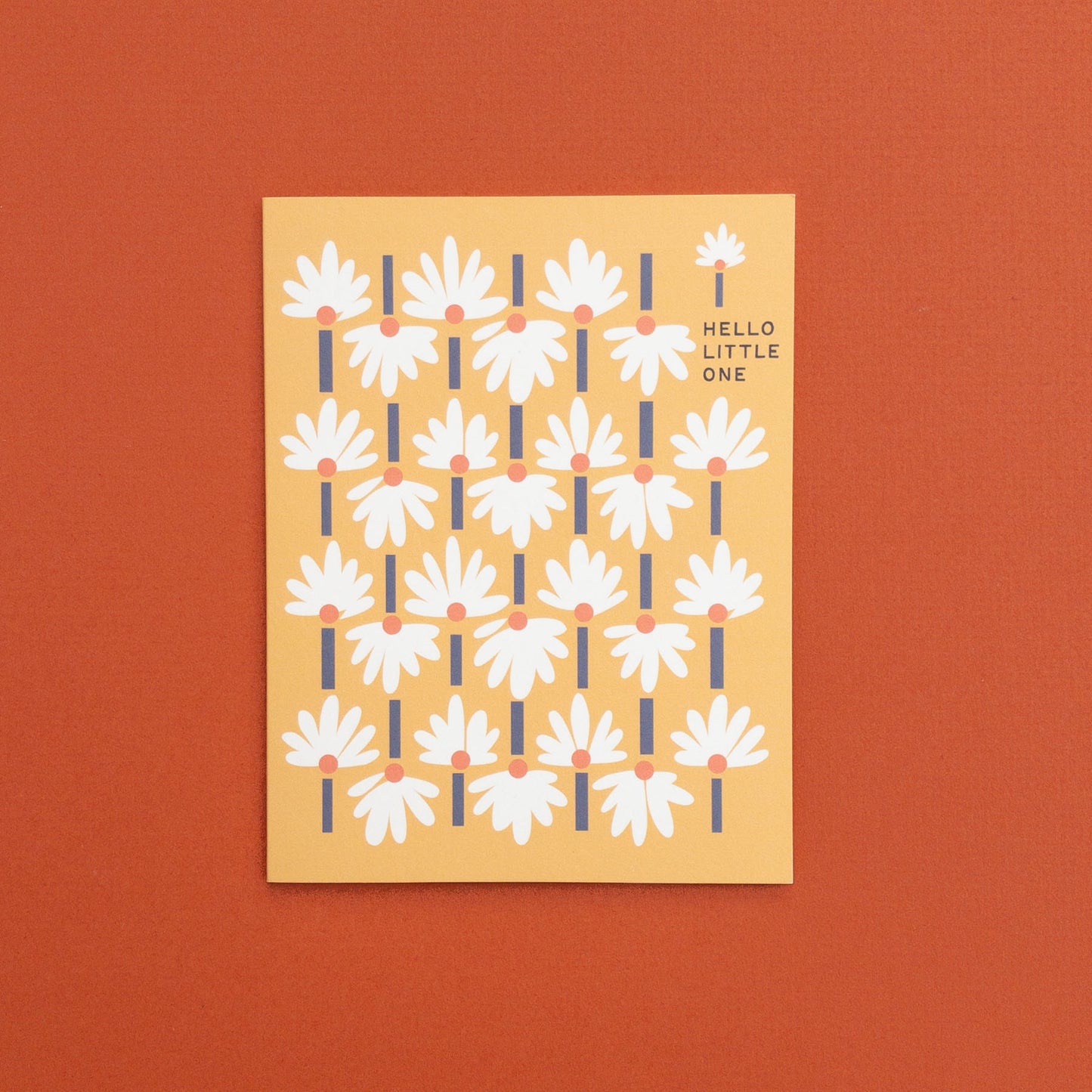 Greeting card with floral pattern and 'Hello Little One' text on a yellow background
