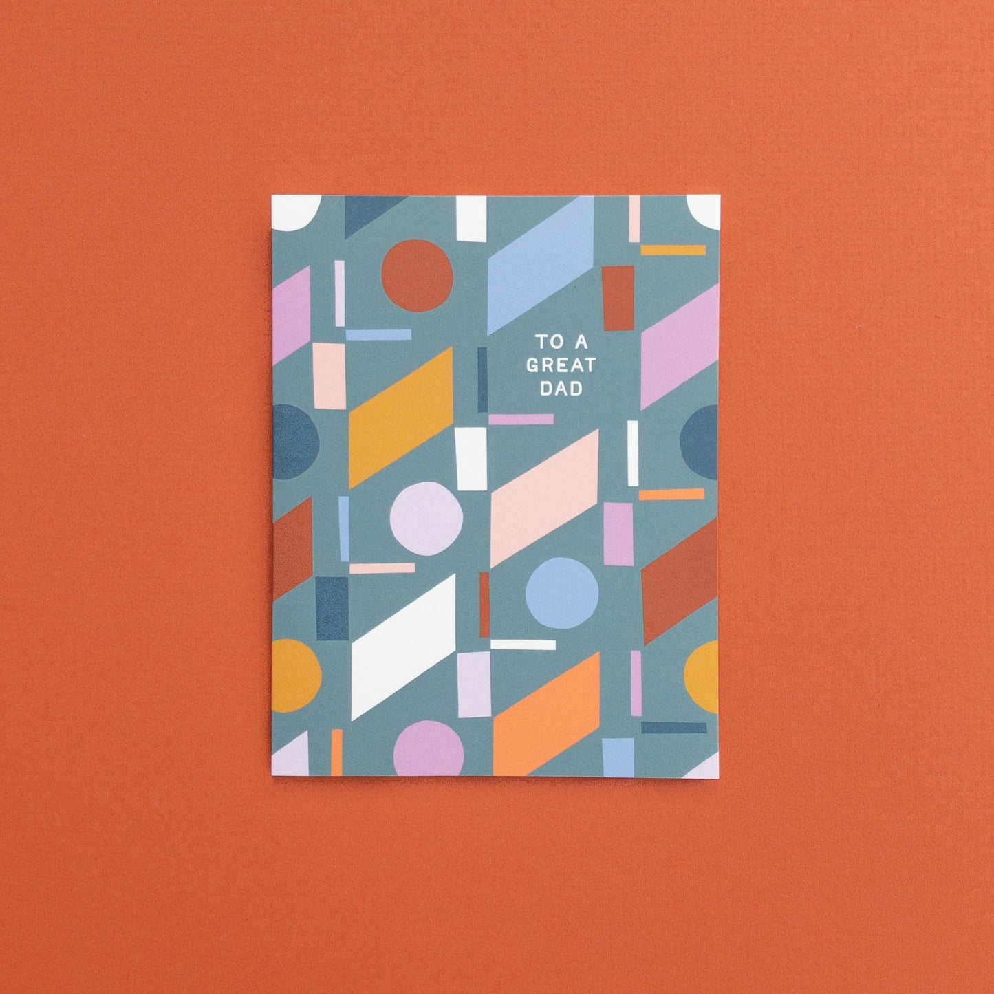 Colorful geometric patterned card with 'To a Great Dad' text 