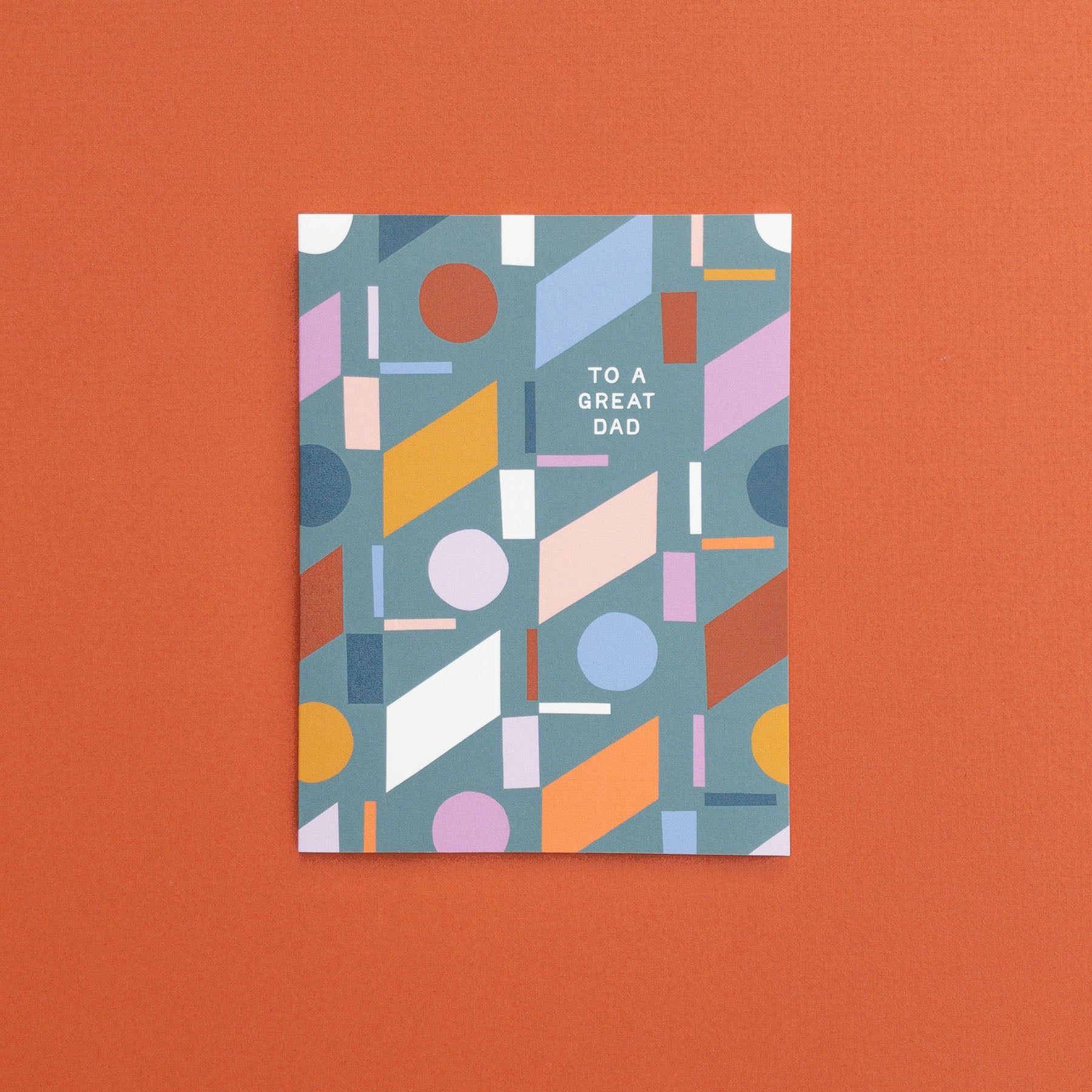Colorful geometric patterned card with 'To a Great Dad' text 