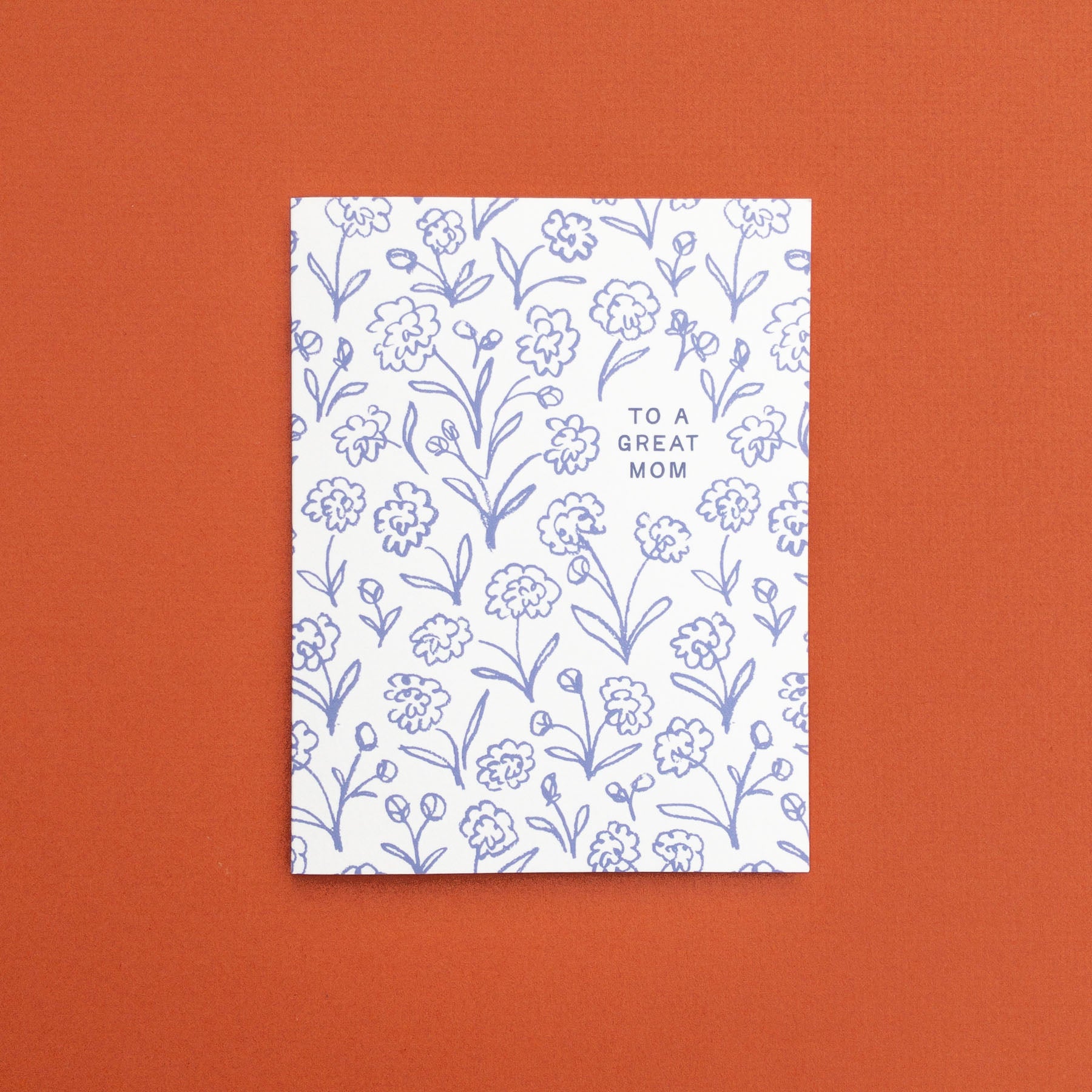 Greeting card with floral pattern and 'To a Great Mom' text