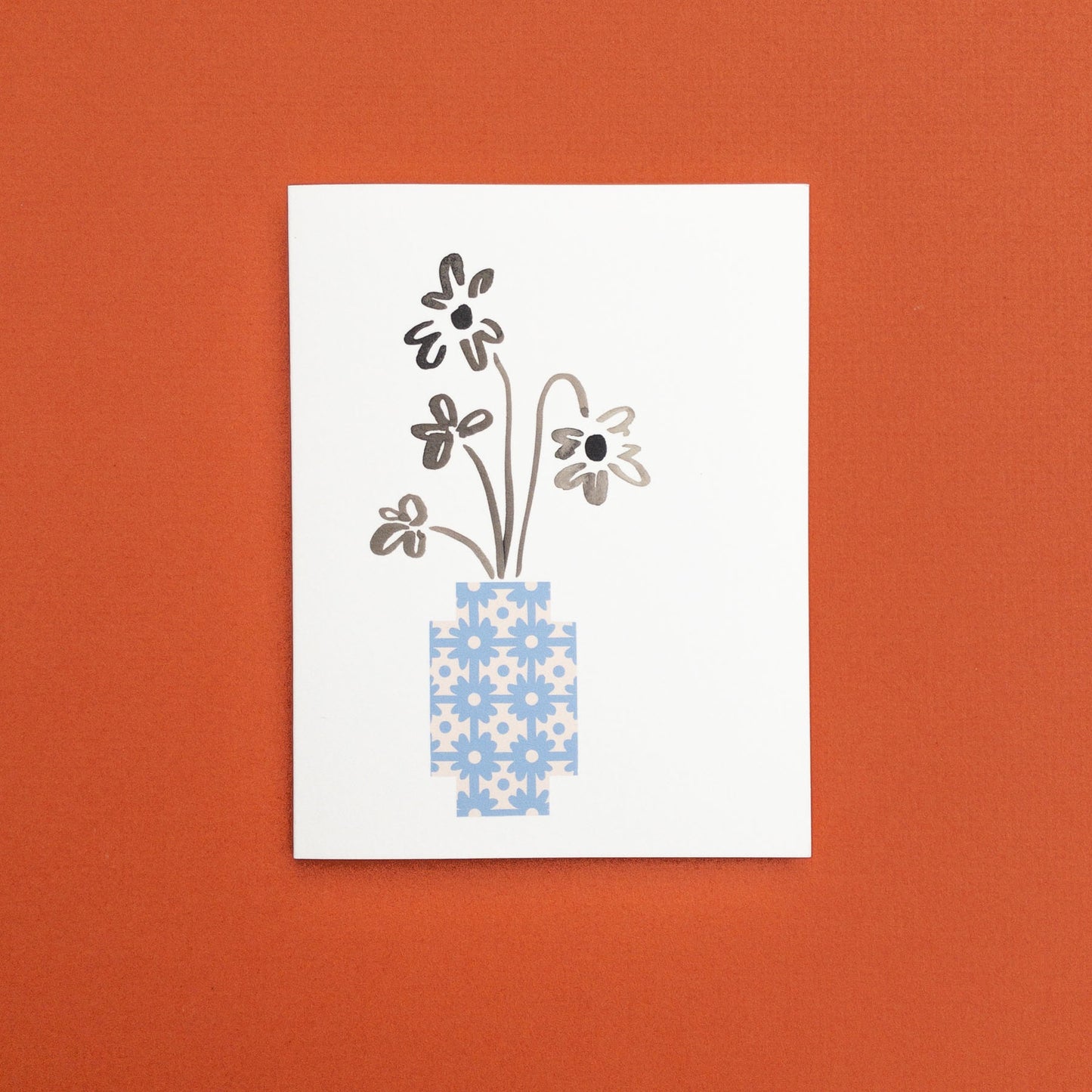 Botanical greeting card with floral design and blue patterned vase 