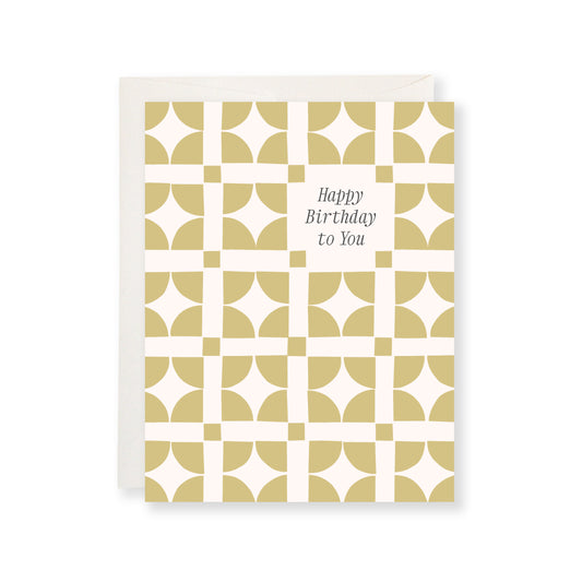 Birthday card with geometric pattern and 'Happy Birthday To You' text on a white background