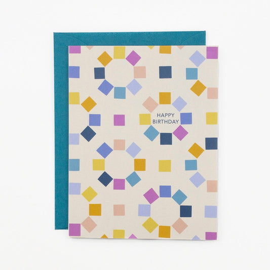 Greeting card featuring colorful squares and the message "Happy birthday".