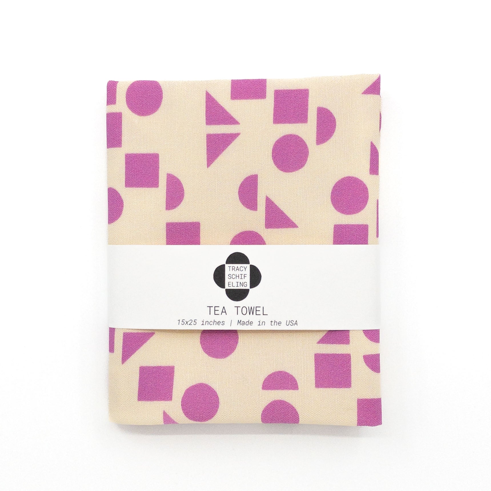 Vibrant geometric tea towel featuring a pattern of circles, triangles, and squares.